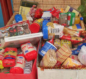 Foto. Recollida joguines i aliments.